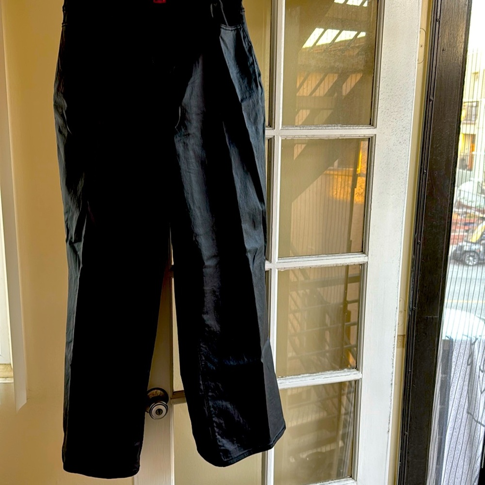 Faux leather wide leg pants with back patch pockets and front pockets